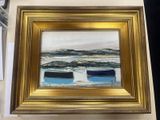 a picture of a painting of boats in a gold frame