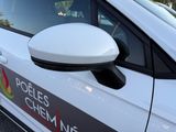 a close up of a car with a side mirror on it