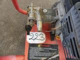 a close up of a motorcycle engine with a sticker on it