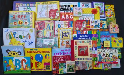 a lot of children ' s books on the table
