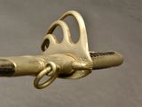 a close up of a metal object with a handle