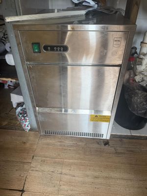 an image of a stainless steel dishwasher in a kitchen