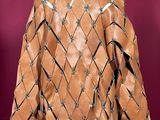 an image of a brown leather jacket on a mannequin mannequin