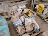 a lot of bags of cement on a pallet