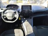 the interior of a car with a steering wheel, dashboard, and dash board