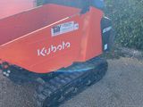 a small tractor that is sitting on the ground