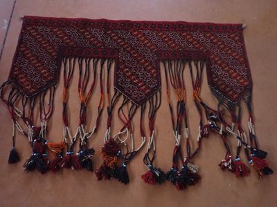 Tapis de selle, noué main,130x106 cm environ (accidents)