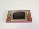 a close up of a nintendo game console on a white surface