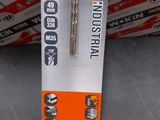 a box of drill bits sitting on a table