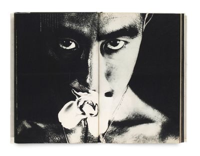 a book with a picture of a man with a flower in his mouth