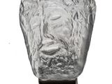 an image of a sculpture of a man ' s face