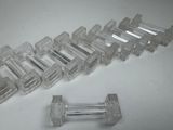 a lot of clear glass pieces on the table