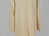 a beige coat on a mannequin mannequin mannequin mannequin mannequin mannequin mannequin mannequin mannequin