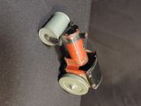 a roll of tape attached to the back of a car