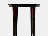 a black table with two legs and a wooden top