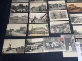 several old black and white photos of a bunch of buildings