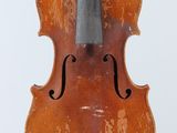 a close up of a violin on a stand with a white background