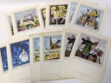 several cards with pictures of people and animals on them on a white surface