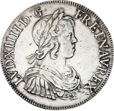 a close up of a coin with a woman ' s head on it