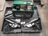 une boîte verte contenant des outils, posée sur le sol