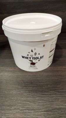 a bucket of whey solat sitting on a table