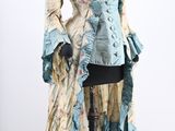 an image of a mannequin dressed in a blue and white dress