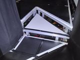 a chair that is sitting in the middle of a room