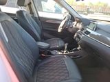 the interior of a car with black leather seats and a steering wheel