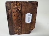 a piece of wood that has a tag on it