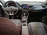 the interior of a car with a steering wheel, dashboard, and dash board