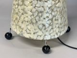a lamp that is sitting on top of a table