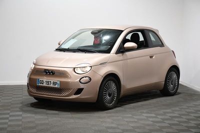 an image of a smart car parked in a showroom