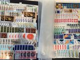 a lot of stamps and stamps in a box