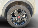 a close up of a tire on a car ' s rim
