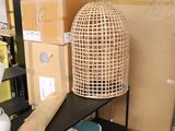 a lot of boxes and a lamp in a room