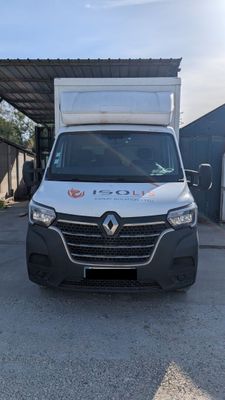 an image of a white van parked in a parking lot