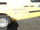 a yellow truck that is parked in a parking lot
