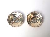 pair of silver plated ashtrays on a white background