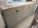 a cabinet with a window in the middle of the room