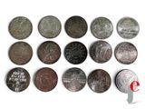 a lot of different coins that are on the table