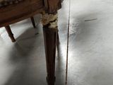 a chair that is sitting in the middle of a room