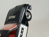 a close up of a cell phone with a police badge on it