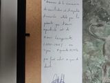 a picture of a picture of a lion and a letter from a child