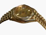 an image of a gold rolex watch on a white background