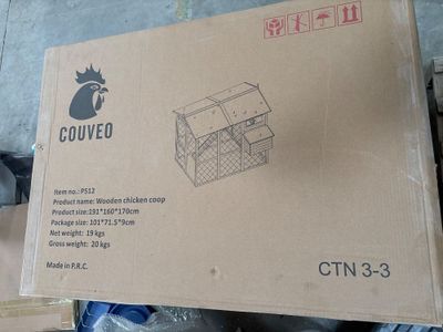 a cardboard box with a picture of a cat inside of it