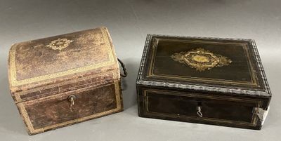 two boxes that are sitting side by side on a table