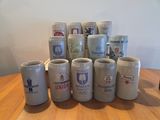 a lot of beer mugs sitting on a table