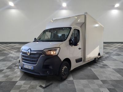 a picture of a white van parked in a large room