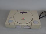 sony playstation classic game console with shark decal