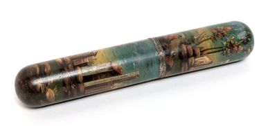 a small tube with a picture on it on a white surface